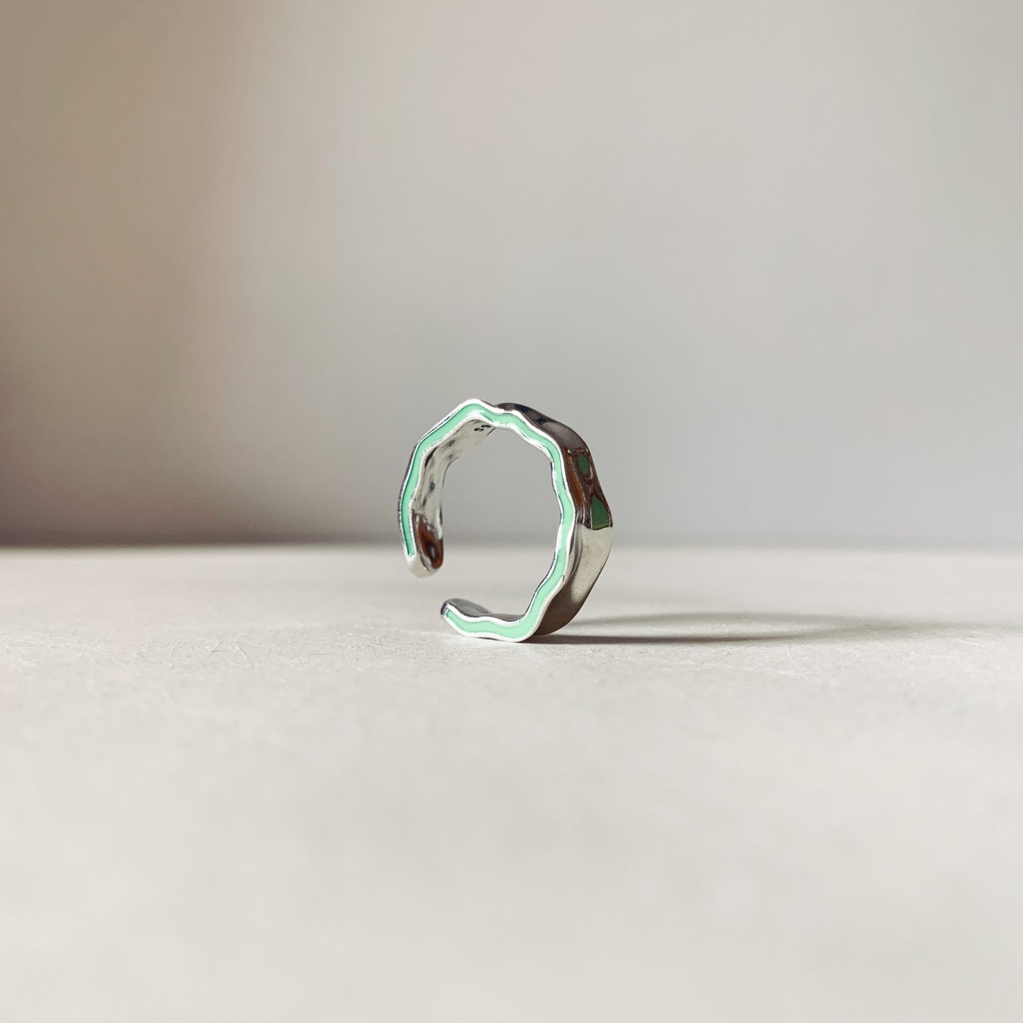 Asymmetric Green Line Open Ring